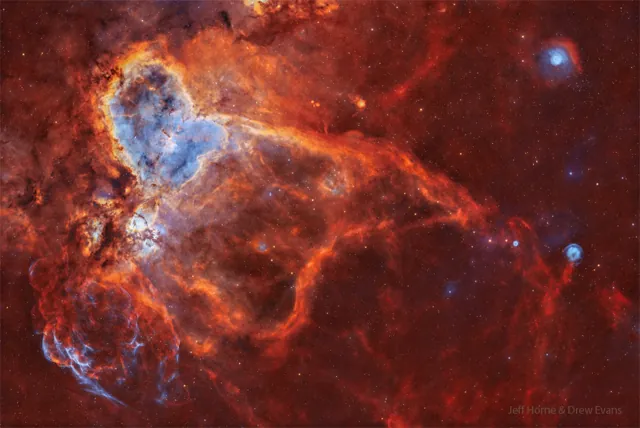 The Heart Nebula and surrounding glowing gas in a wide star field